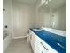 Bathroom featuring a soaking tub, shower, and white vanity with a large mirror at 960 Hawksnest Pt, Oviedo, FL 32765