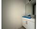 Bright bathroom with white vanity, sink, and modern fixtures at 960 Hawksnest Pt, Oviedo, FL 32765
