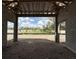 Covered outdoor living space under construction with an open view of the surrounding property at 960 Hawksnest Pt, Oviedo, FL 32765