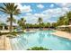 Expansive pool with sun loungers and ample space, ideal for relaxation and enjoying the outdoors at 9574 Meadow Hunt Way, Winter Garden, FL 34787