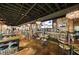 Restaurant interior with seating, bar, lighting, and televisions at 9574 Meadow Hunt Way, Winter Garden, FL 34787