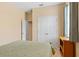 Comfortable bedroom featuring a double door closet and natural light at 1023 Hermosa Way, Kissimmee, FL 34744