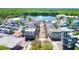 Aerial view of a town, showcasing its architectural details, parking lots and rows of trees at 1131 Indigo Dr, Celebration, FL 34747