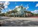Charming street view with colorful buildings, storefronts and pedestrian crosswalks on a sunny day at 1131 Indigo Dr, Celebration, FL 34747