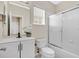 Bathroom featuring a shower-tub combo, and updated vanity at 1131 Indigo Dr, Kissimmee, FL 34747