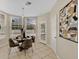 Cozy breakfast nook featuring tile flooring, lots of natural light, and modern decor at 1131 Indigo Dr, Kissimmee, FL 34747