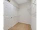 Walk-in closet with adjustable shelves and carpet flooring at 1131 Indigo Dr, Kissimmee, FL 34747