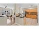Open concept kitchen with granite countertops and stainless steel appliances at 1131 Indigo Dr, Kissimmee, FL 34747