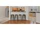 Spacious kitchen featuring a breakfast bar and stainless steel appliances at 1131 Indigo Dr, Kissimmee, FL 34747