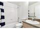 Tiled bathroom with shower-tub combo, granite vanity, and tiled floors at 1180 S Beach Cir, Kissimmee, FL 34746
