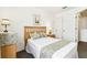 Comfortable bedroom with full-sized bed, matching nightstands, and closet at 1180 S Beach Cir, Kissimmee, FL 34746
