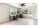 Inviting dining area with multiple tables and chairs, perfect for enjoying meals with a view of the community at 1180 S Beach Cir, Kissimmee, FL 34746