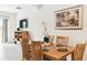 Dining room with tile flooring, chandelier, and view of a balcony at 1180 S Beach Cir, Kissimmee, FL 34746