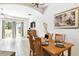 Light-filled dining room featuring access to a balcony at 1180 S Beach Cir, Kissimmee, FL 34746