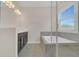 Bathroom showcasing a soaking tub with glass partition and vanity with ample storage at 12307 Turtle Grass Dr, Orlando, FL 32824