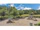 Community playground with slides, climbing structures and picnic tables, perfect for Gathering fun at 12307 Turtle Grass Dr, Orlando, FL 32824