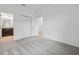 Carpet bedroom with a view to the bathroom at 1247 Blue Daze Ln, Eustis, FL 32726