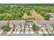 An aerial view showcasing a row of houses, each with its own driveway and well-maintained front yard at 1262 E 10Th St, Apopka, FL 32703