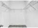 Walk-in closet with carpeted floor and wire shelving at 1262 E 10Th St, Apopka, FL 32703