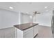 Open-concept living area with tile floors, recessed lighting, and ceiling fan at 1262 E 10Th St, Apopka, FL 32703