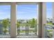 Relaxing balcony with views of the neighborhood showcasing metal railings and modern design at 13437 Granger Ave, Orlando, FL 32827