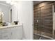 Modern bathroom with a walk-in shower, sleek vanity, and stylish finishes at 13437 Granger Ave, Orlando, FL 32827