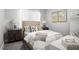 Comfortable bedroom with neutral tones, creating a serene and restful atmosphere at 13437 Granger Ave, Orlando, FL 32827