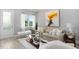 Bright living room with stylish decor, modern art and comfortable furniture at 13437 Granger Ave, Orlando, FL 32827