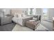 Inviting main bedroom with a plush bed, stylish decor, and ample natural light at 13437 Granger Ave, Orlando, FL 32827