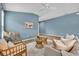 Bright living room with vaulted ceilings and stylish furnishings in an open floor plan at 1397 Gatlin Pl, The Villages, FL 32163