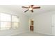 Bedroom with neutral carpet, ceiling fan and window at 1441 Twin Trees Ln, Sanford, FL 32771