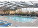 Bright community pool provides a refreshing escape with plenty of seating for residents and guests at 1441 Twin Trees Ln, Sanford, FL 32771