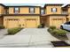 Inviting townhome with a two-car garage and lovely landscaping at 1441 Twin Trees Ln, Sanford, FL 32771