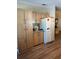 Spacious kitchen with ample wood cabinets and modern appliances at 158 Rita Bee Ave, Davenport, FL 33897