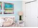 A well-lit bedroom features serene decor, closet, and stylish furnishings creating a tranquil retreat at 17419 Placidity Ave, Clermont, FL 34714