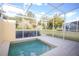 Enclosed private spa with screened walls and beautiful view at 17419 Placidity Ave, Clermont, FL 34714