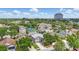 Aerial view of home in a well-developed neighborhood with mature trees and community tennis courts at 1758 Bobtail Dr, Maitland, FL 32751