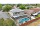 Overhead view of the home and screened pool area, highlighting the landscaped backyard and surroundings at 1758 Bobtail Dr, Maitland, FL 32751