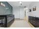 Charming Bedroom boasts dark green decor and a view into the hallway at 1758 Bobtail Dr, Maitland, FL 32751