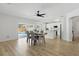 Bright dining area flows into an open concept kitchen with sliding doors overlooking the pool at 1758 Bobtail Dr, Maitland, FL 32751