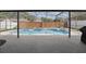 Inviting screened-in pool area with a pool and spa surrounded by brick and privacy fences at 1758 Bobtail Dr, Maitland, FL 32751