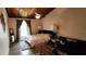 Cozy bedroom with a wood ceiling, ceiling fan, and a comfortable bed and futon at 200 Maitland Ave # 232, Altamonte Springs, FL 32701