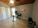 Bedroom featuring hardwood floors, a ceiling fan, and a built in desk at 200 Maitland Ave # 232, Altamonte Springs, FL 32701