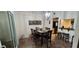 Dining room with seating for six and access to the lanai at 200 Maitland Ave # 232, Altamonte Springs, FL 32701