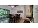 Dining room with seating for eight, and sliding glass door to the lanai at 200 Maitland Ave # 232, Altamonte Springs, FL 32701