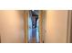 Hallway leading to a bedroom with wood floors and a view of the interior at 200 Maitland Ave # 232, Altamonte Springs, FL 32701