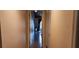 Hallway leading to a bedroom with wood floors and a view of the interior at 200 Maitland Ave # 232, Altamonte Springs, FL 32701
