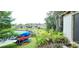 Scenic view of lake and surrounding community; note canoes for resident use at 200 Maitland Ave # 232, Altamonte Springs, FL 32701