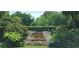 A beautiful rock water feature set amid lush landscaping at 200 Maitland Ave # 232, Altamonte Springs, FL 32701