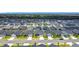 Expansive aerial shot showcasing a neighborhood filled with homes, emphasizing community living at 2005 Noble Dr, Davenport, FL 33837